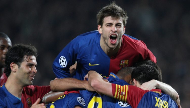 Gerard Pique celebrates with his Barcelona team-mates. Camp Nou, March 2009.