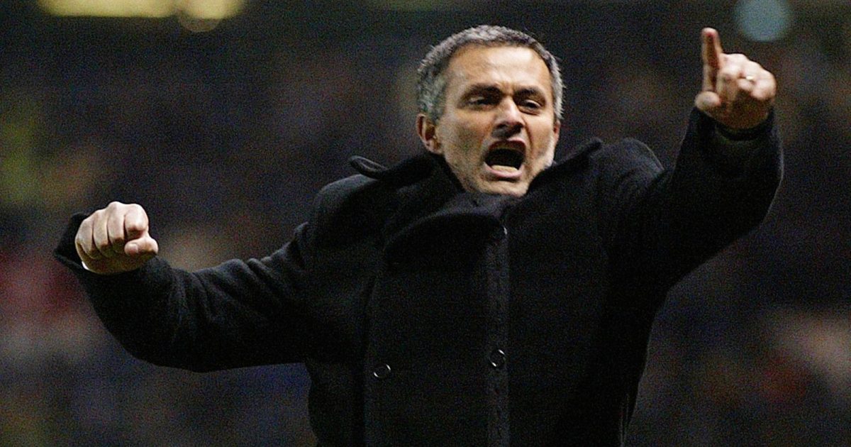 Jose Mourinho celebrates his Porto team's late goal in the Champions League game against Manchester United at Old Trafford, Manchester. 9 March 2004.