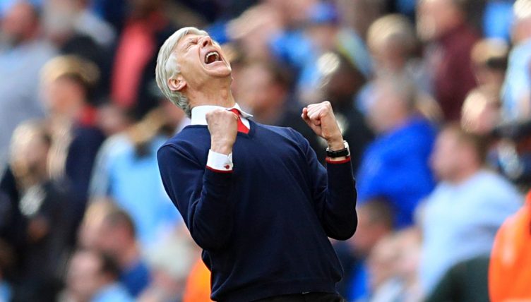 Arsenal manager Arsene Wenger celebrates after the final whistle of the Emirates FA Cup, Semi Final match at Wembley Stadium, London.