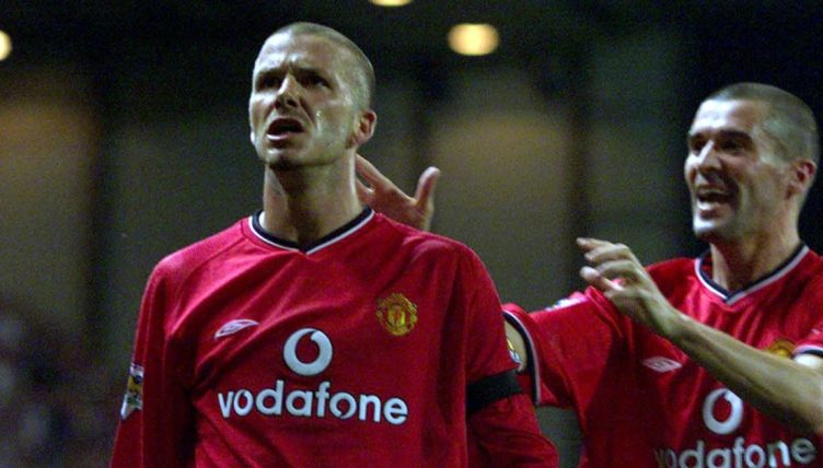 David Beckham celebrates scoring for Manchester United at Old Trafford, Manchester. January 2002.