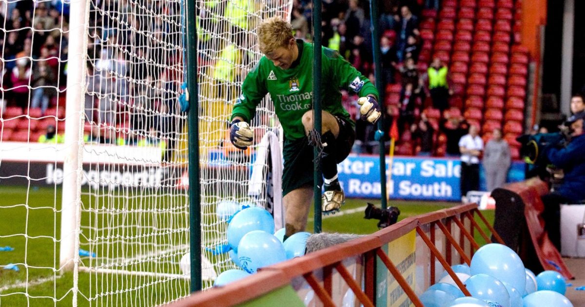 Manchester City goalkeeper Joe Hart burst balloons after Sheffield United's Luton Sherton scores during the FA Cup Fourth Round match at Bramall Lane, Sheffield.