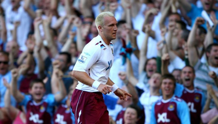 West Ham striker Dean Ashton celebrates scoring for the club
