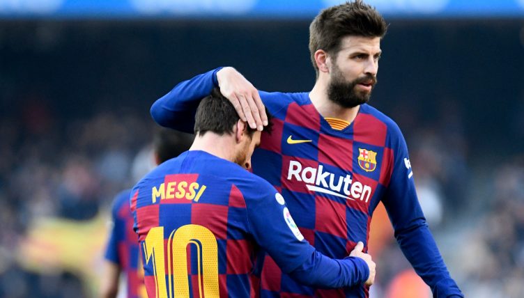 FC Barcelona's Lionel Messi and Gerard Pique during the La Liga game v Espanyol at Camp Nou, Barcelona, Spain, March 2020.