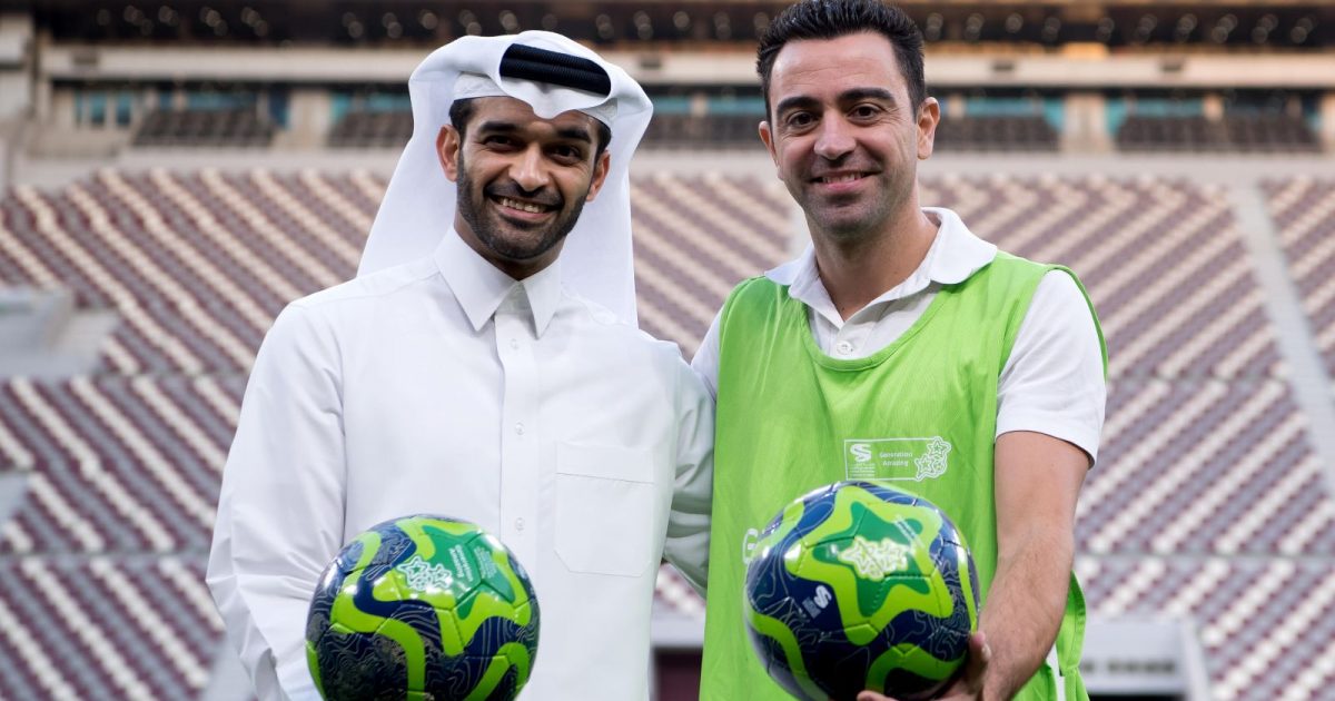 The general secretary of the World Cup's organisation committee Hassan Al-Thawadi and the World Cup ambassador Xavi Hernandez at the Khalifa International Stadium in Doha, Qatar, 4 January 2018..