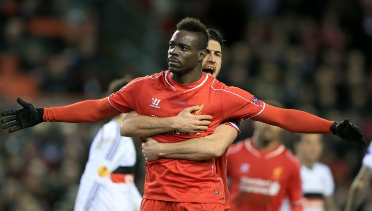 Mario Balotelli celebrates scoring a goal for Liverpool