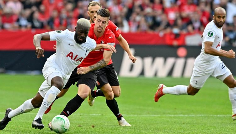 Tanguy Ndombele protects the ball from Baptiste Santamaria as Tottenham Hotspur draw against Stade Rennais. Roazhon Park.