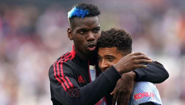 Paul Pogba and Jadon Sancho celebrate after Manchester United win.