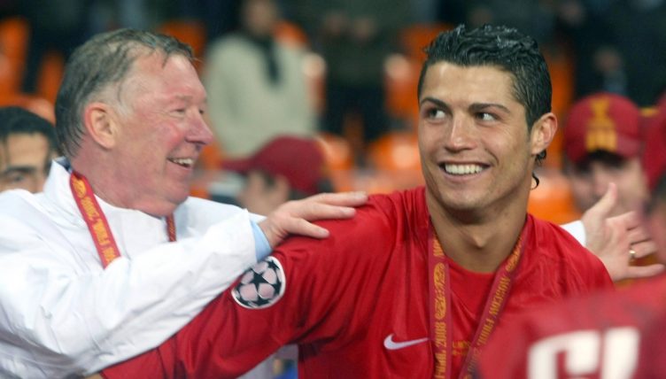 Cristiano Ronaldo and Sir Alex Ferguson celebrate after Manchester United win the Champions League.