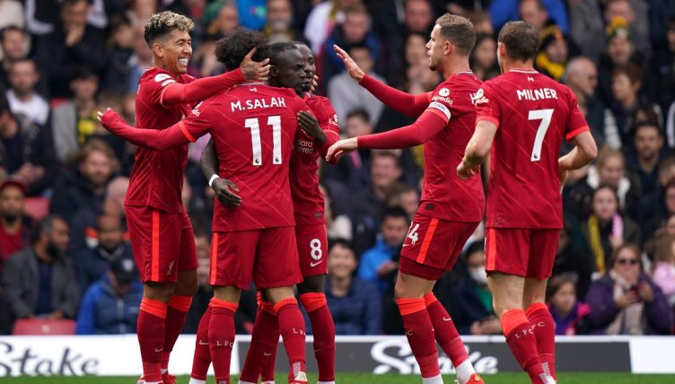 Sadio Mane celebrates with his team-mates after scoring for Liverpool.
