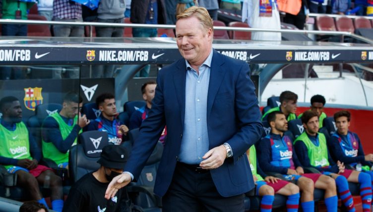 Ronald Koeman stands on the touchline before Barcelona's game against Real Madrid,