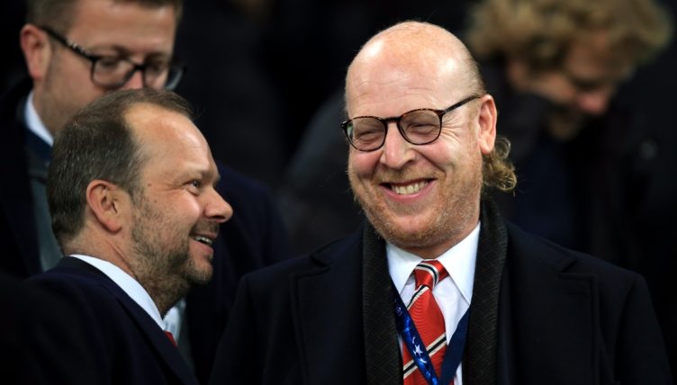 Manchester United co-owner Avram Glazer talks with Ed Woodward.