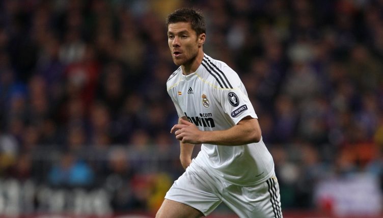 Real Madrid's Xabi Alonso playing against AC Milan.