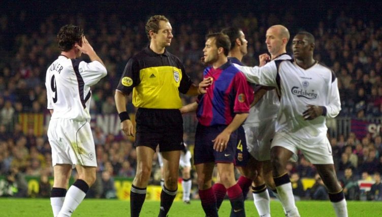 Barcelona and Liverpool players scrap during their UEFA Cup match, April 2001.