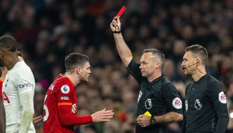Liverpool's Andy Robertson is shown a red card by referee Paul Tierney during the match against Tottenham Hotspur, The Tottenham Hotspur stadium, 20 December 2021
