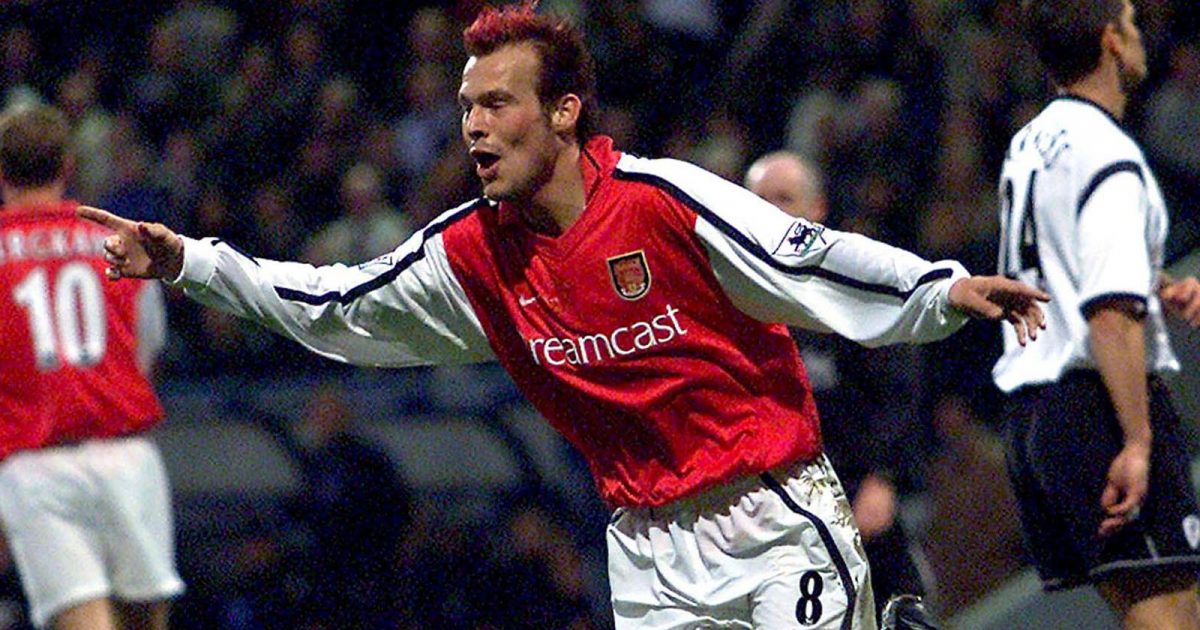 Arsenal's Fredrik Ljungberg of Sweden celebrates his goal against Bolton Wanderers during their English Premier League match at the Reebok Stadium, in Bolton