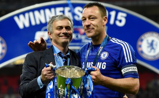 Chelsea manager Jose Mourinho celebrates his side winning the Capital One Cup with John Terry after beating Tottenham at Wembley, London, 01 March 2015.