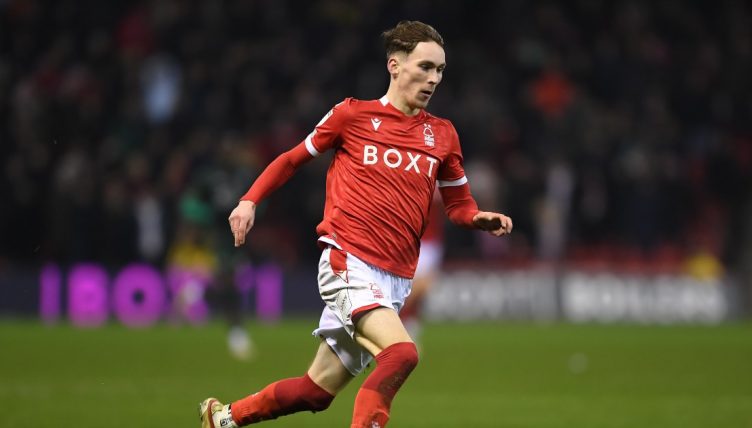 James Garner running with the ball for Nottingham Forest against Barnsley in the Championship, The City Ground 25 January 2022.