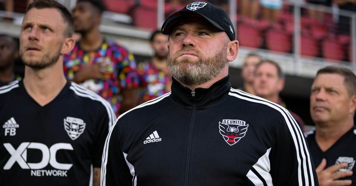 DC United Head Coach Wayne Rooney listens to the national anthem prior to a DC United vs New York Red Bulls