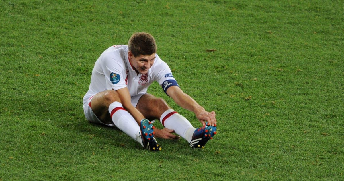 Steven Gerrard suffers from cramp during the UEFA European Championship match between England and Italy at Olympic Stadium, Kyiv, June 2012.