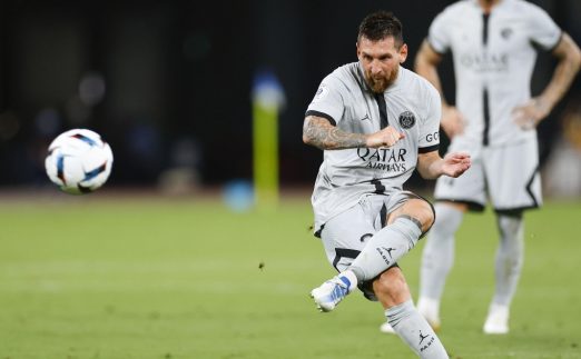 Paris Saint-Germain's Lionel Messi takes a free kick during the second half of a PSG Japan Tour football match against Kawasaki Frontale at Tokyo's National Stadium on July 20, 2022.
