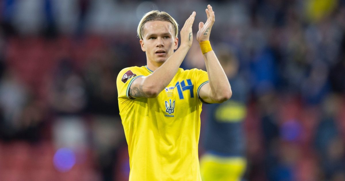 Ukraine midfielder Mykhaylo Mudryk applauds their travelling support after their FIFA World Cup qualifying victory over Scotland at Hampden Park, Glasgow, June 2022.