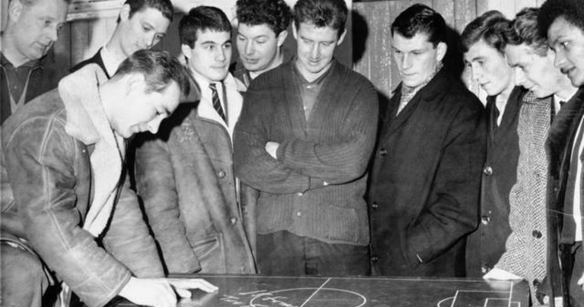 Brian Clough talks tactis with his Hartlepools United players in the dressing room at Victoria Park, Hartlepool, England. 1965.