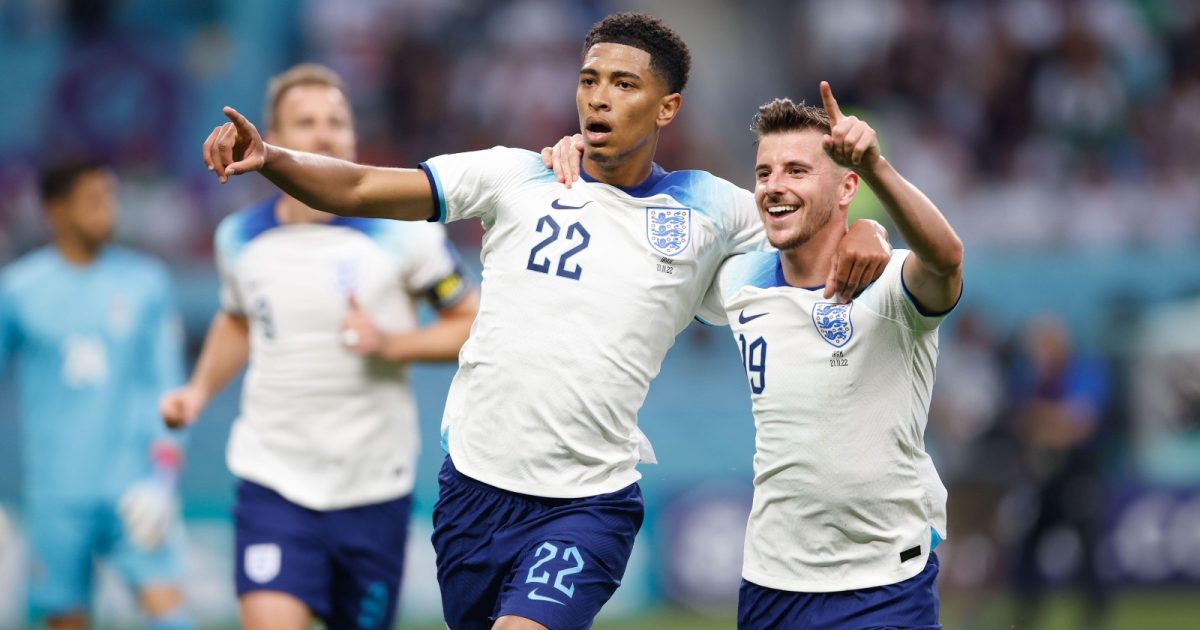Jude Bellingham and Mason Mount celebrate the former's goal during the FIFA World Cup match between England and Iran at Khalifa International Stadium, Doha, Qatar, November 2022.