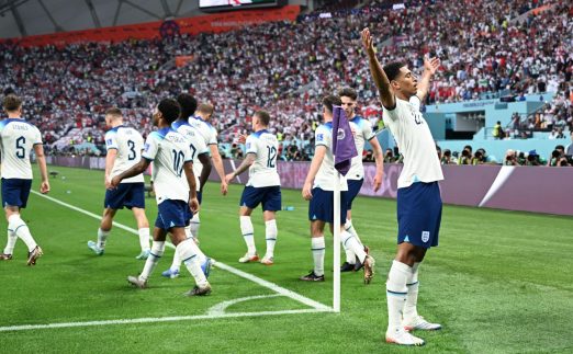 Jude Bellingham of England (1st, R) celebrates after scoring during the Group B match between England and Iran at the 2022 FIFA World Cup at Khalifa International Stadium in Doha, Qatar, Nov. 21, 2022.