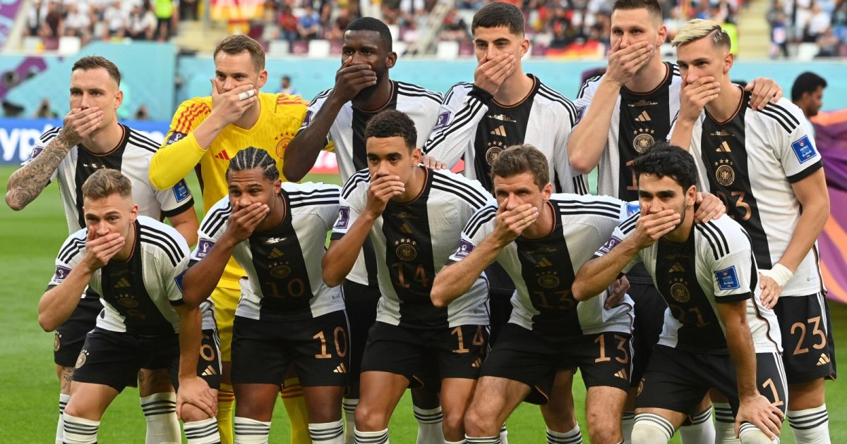 The Germany XI protest against FIFA before their FIFA World Cup match against Japan at Khalifa International Stadium, Doha, Qatar, November 2022.