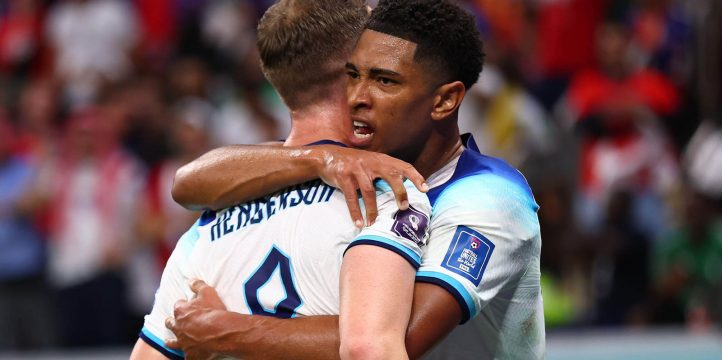 Jordan Henderson of England celebrates after scoring the first goal with provider Jude Bellingham of England