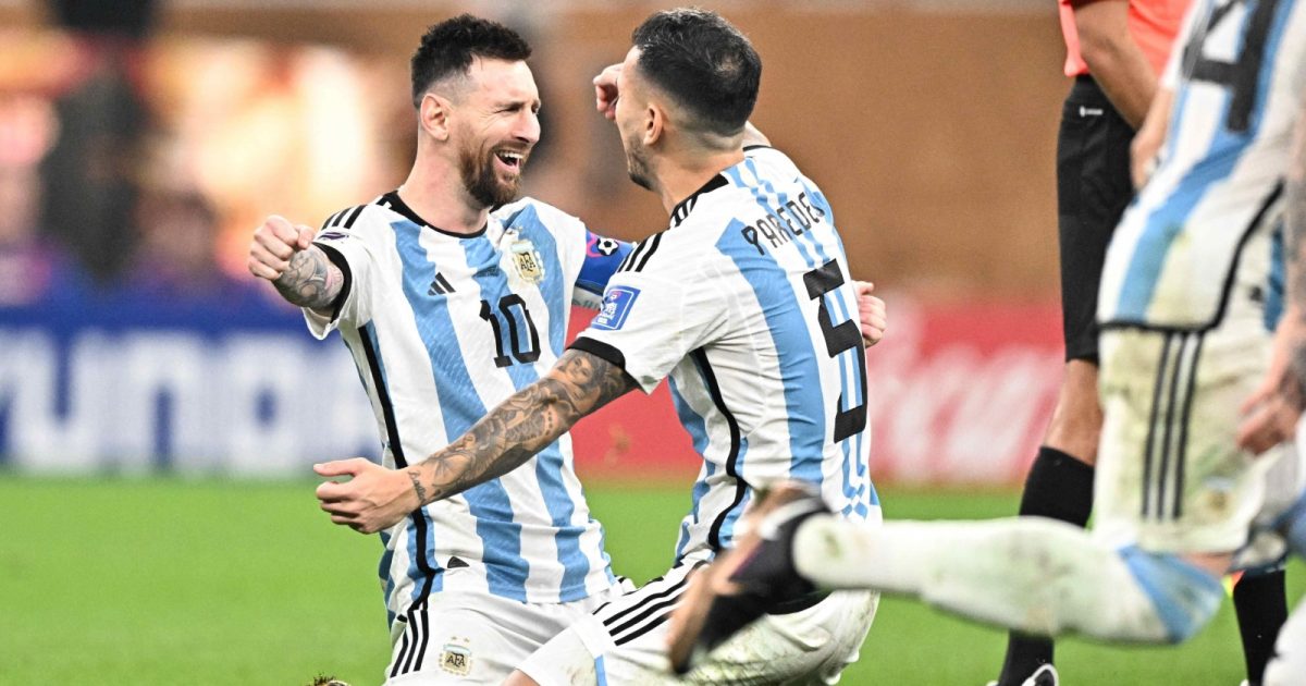 Lionel Messi (10) and Leandro Paredes (5) of Argentina celebrate after winning the Final between Argentina and France at the 2022 FIFA World Cup at Lusail Stadium in Lusail, Qatar, on December 18, 2022.