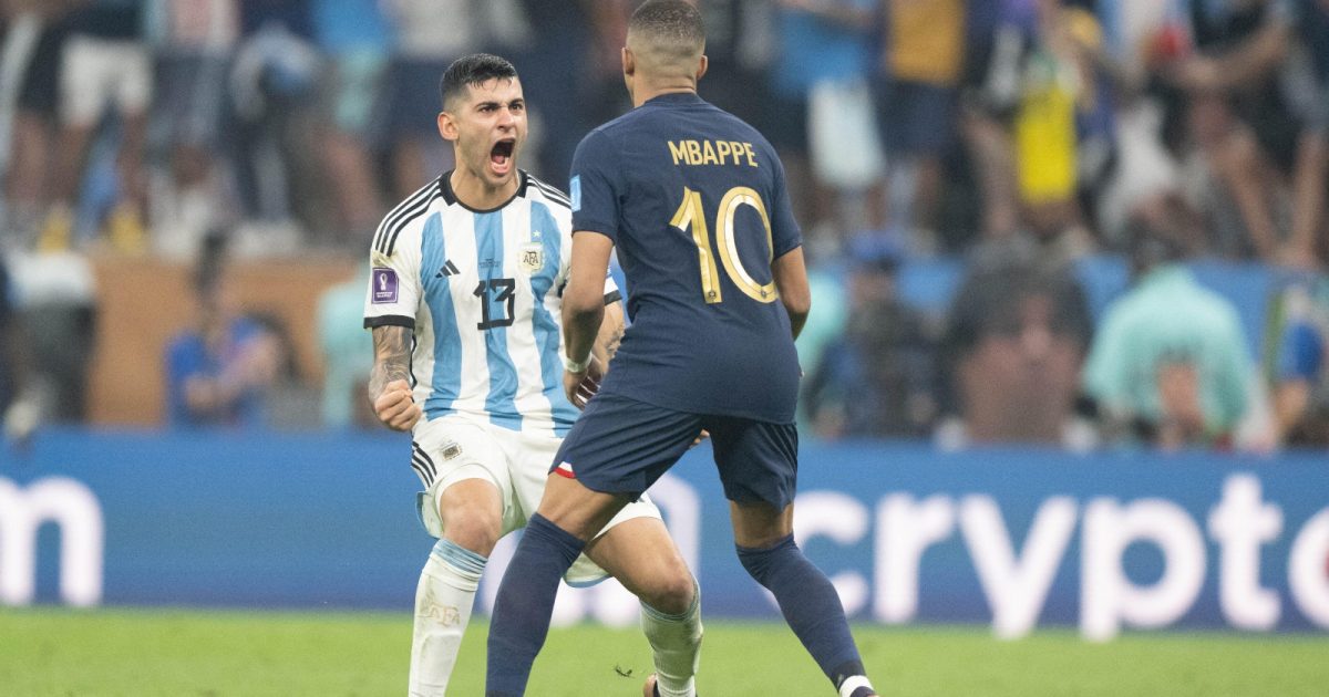 Argentina's Cristian Romero and France's forward Kylian Mbappe in action during the FIFA World Cup Qatar 2022 Final match between Argentina and France at Lusail Stadium on December 18, 2022 in Lusail City, Qatar.