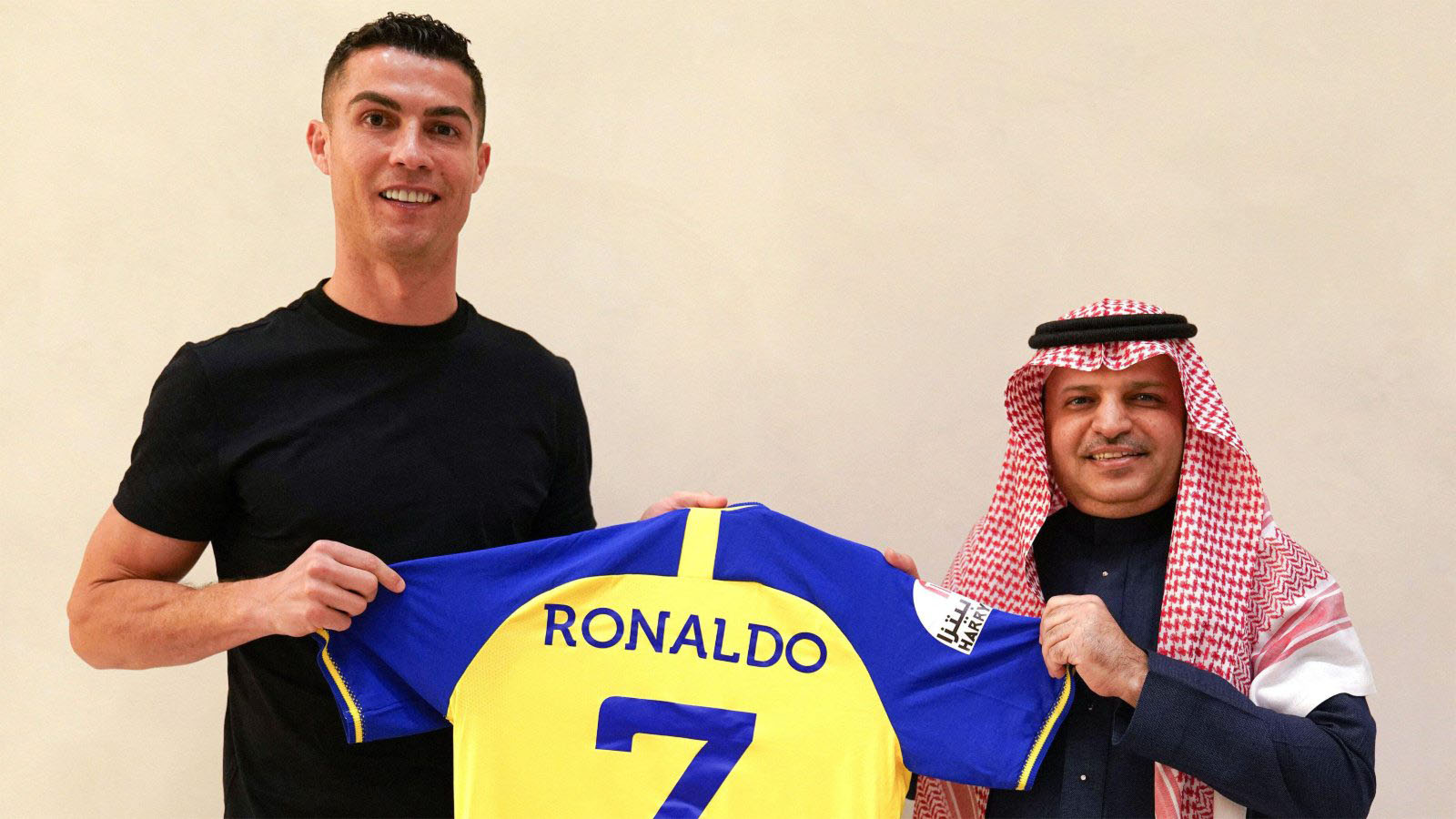 Portuguese football star Cristiano Ronaldo poses with AlNassr Football Club President Mossali Al-Muammar as he signs to play in the Saudi club, in Riyadh, Kingdom of Saudi Arabia, on December 30, 2022.