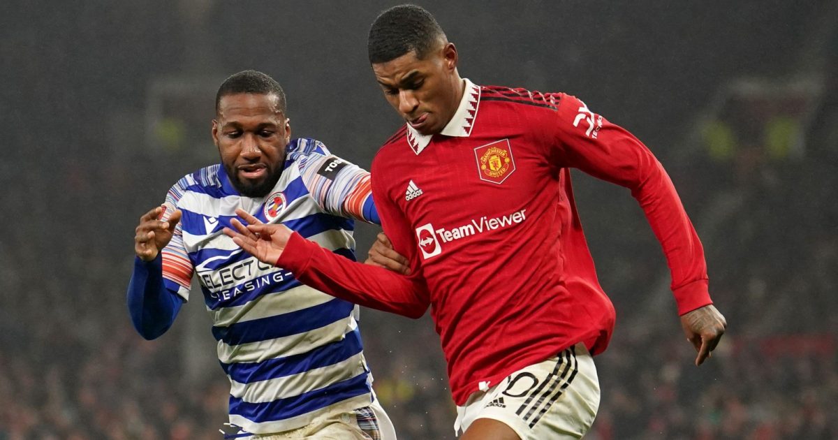 Reading's Junior Hoilett (left) and Manchester United's Marcus Rashford battle for the ball during the Emirates FA Cup fourth round match at Old Trafford, Manchester. Picture date: Saturday January 28, 2023.