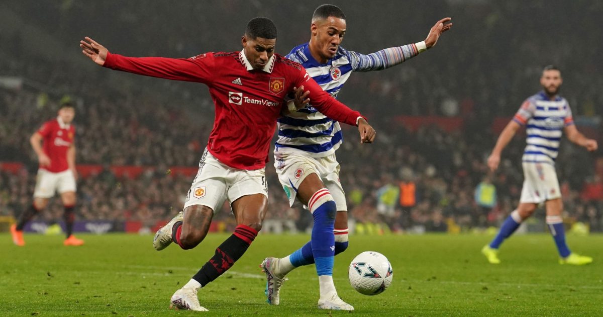 Manchester United's Marcus Rashford (left) and Reading's Thomas Ince battle for the ball during the Emirates FA Cup fourth round match at Old Trafford, Manchester. Picture date: Saturday January 28, 2023.