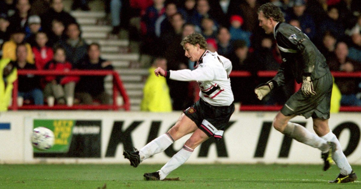 Ole Gunnar Solskjaer goes around Nottingham Forest's keeper, Dave Beasant to score Manchester United's seventh goal of the game ... Soccer - FA Carling Premiership - Nottingham Forest v Manchester United ... 06-02-1999