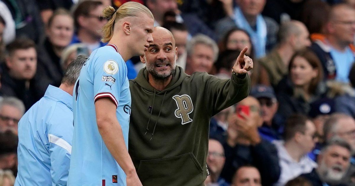 Manchester, UK. 22nd Oct, 2022. Erling Haaland of Manchester City (L) is talked to by Josep Guardiola manager of Manchester City during the Premier League match at the Etihad Stadium, Manchester.