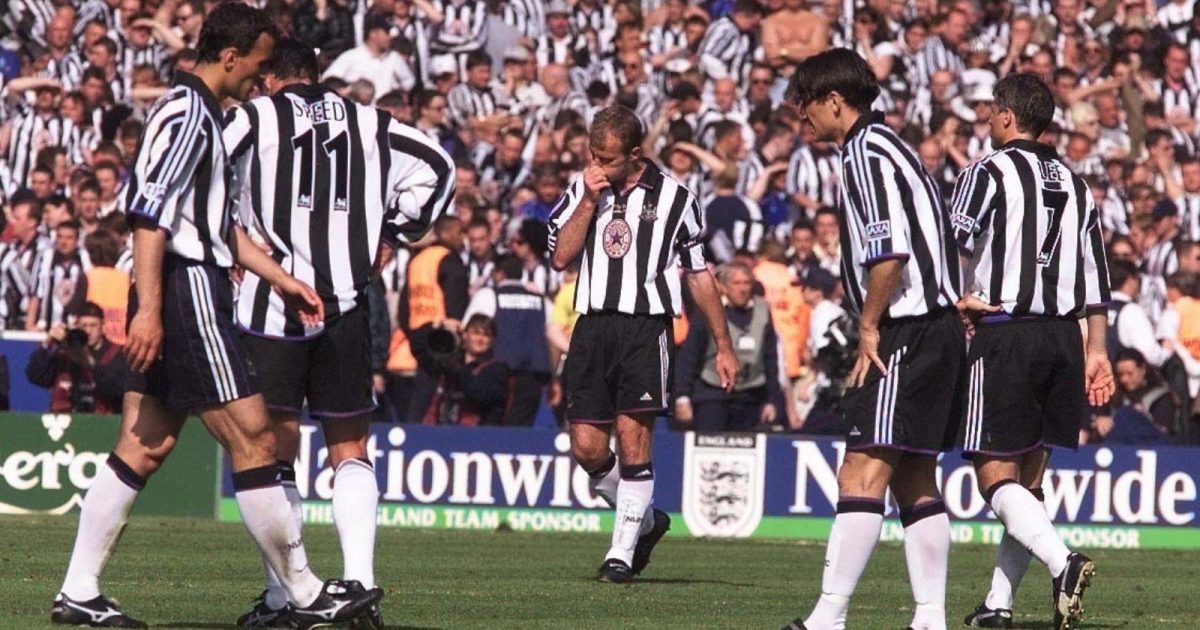 Newcastle United's Alan Shearer (C) looks dejected, following the 2-0 defeat by Manchester United in the AXA FA Cup final at Wembley, May 1999.
