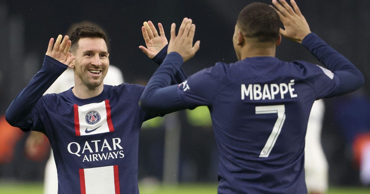 Kylian Mbappe of PSG celebrates his second goal with Lionel Messi (left) during the French championship Ligue 1 football match between Olympique de Marseille (OM) and Paris Saint-Germain (PSG) on February 26, 2023