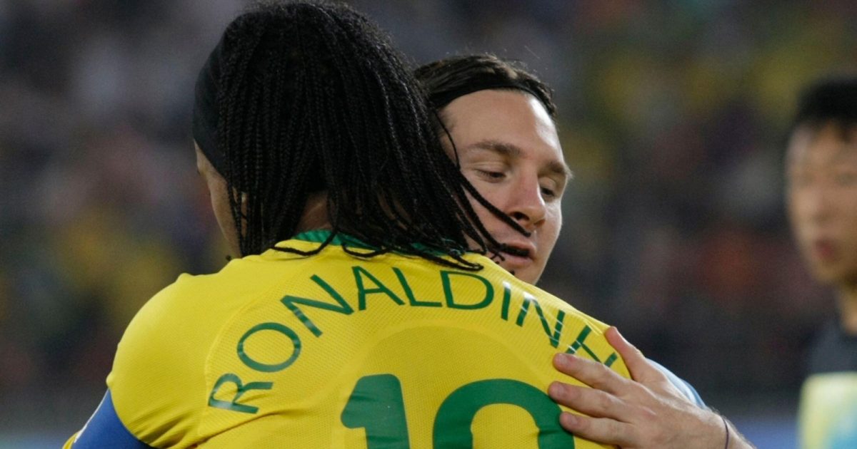 Argentina's Lionel Messi (R) is greeted by Brazil's Ronaldinho before the start of their semi-final soccer match in Worker's Stadium during the 2008 Beijing Olympics, August 19, 2008.