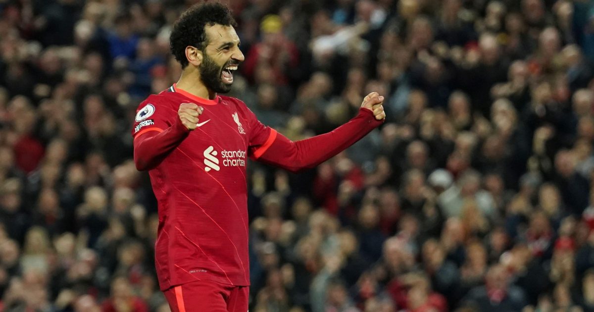 Liverpool's Mohamed Salah celebrates after scoring his side's fourth goal during the English Premier League soccer match between Liverpool and Manchester United at Anfield stadium in Liverpool, England, Tuesday, April 19, 2022.