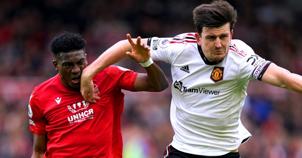 Manchester United's Harry Maguire (right) makes contact with Nottingham Forest's Taiwo Awoniyi during the Premier League match at the City Ground, Nottingham. Picture date: Sunday April 16, 2023.