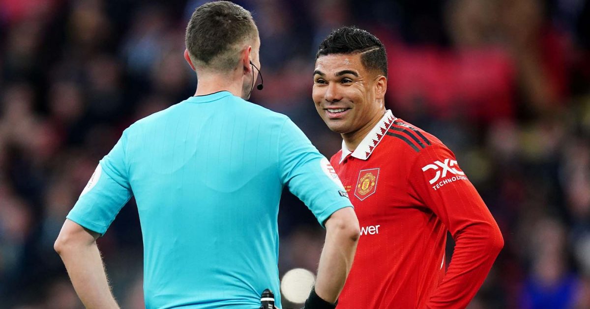 Manchester United's Casemiro talks with referee David Coote during the Carabao Cup Final match at Wembley Stadium, London.