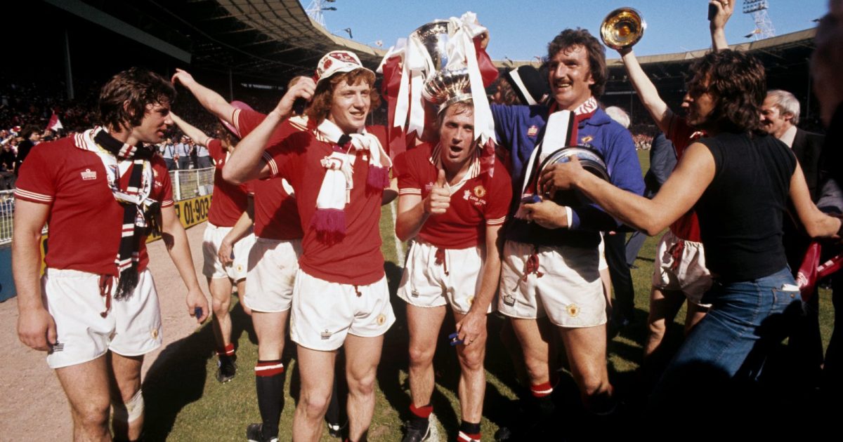 (L-R) Manchester United's Martin Buchan, Jimmy Nicholl, Jimmy Greenhoff and goalkeeper Alex Stepney celebrate with the FA Cup after their 2-1 victory