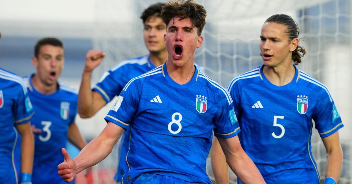 Italy's Cesare Casadei, center, celebrates with teammates after scoring his side's opening goal against Colombia during a FIFA U-20 World Cup quarterfinal soccer match at the Bicentenario stadium in San Juan, Argentina, Saturday, June 3, 2023.