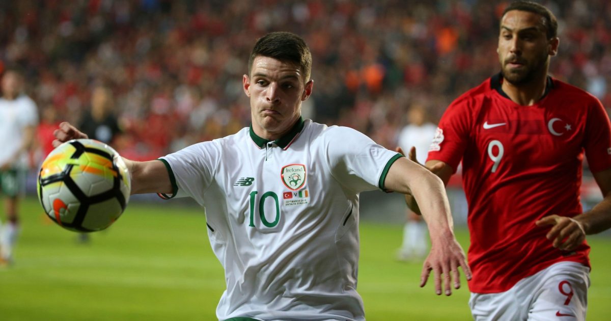 Turkey's Cenk Tosun, right, and Declan Rice of Republic of Ireland, front, during an international friendly soccer match between Turkey and Republic of Ireland in Antalya, Turkey, Friday, March 23, 2018.