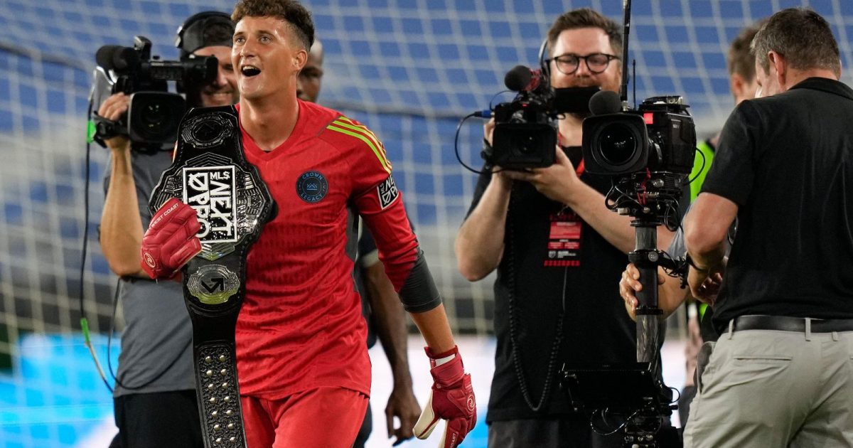 Crown Legacy FC goalkeeper Isaac Walker celebrates after winning the goalie wars segment of the MLS All-Star Skills Challenge