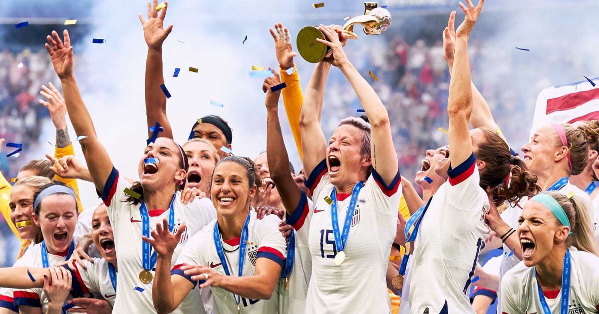 USA lifting the FIFA Women's World Cup trophy in 2019.