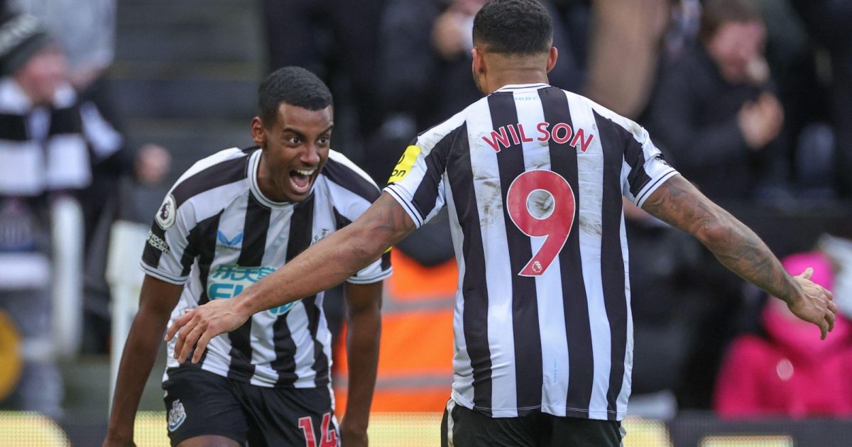 Alexander Isak #14 of Newcastle United celebrates his goal to make it 1-0 with Callum Wilson #9 of Newcastle United during the Premier League match Newcastle United vs Fulham at St. James's Park, Newcastle, United Kingdom, 15th January 2023