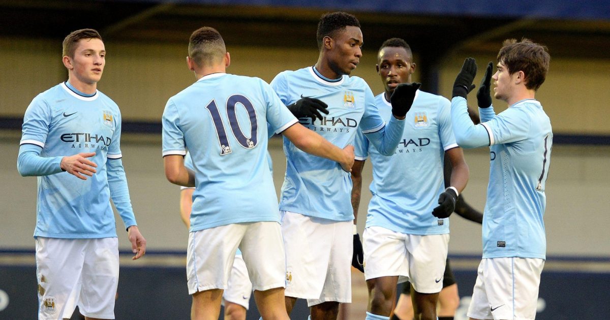 Manchester City U19's Devante Cole (centre)) celebrates scoring his teams 1st goal against FC Viktoria Plzen U19's during the UEFA Youth League match Hyde FC, Hyde.